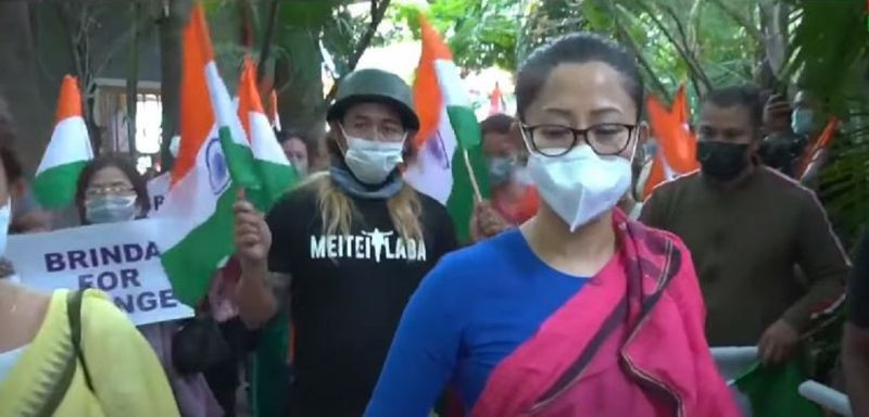Controverial lady cop Th Brinda leading her election rally that was foiled by police on October 17. (NNN Photo)